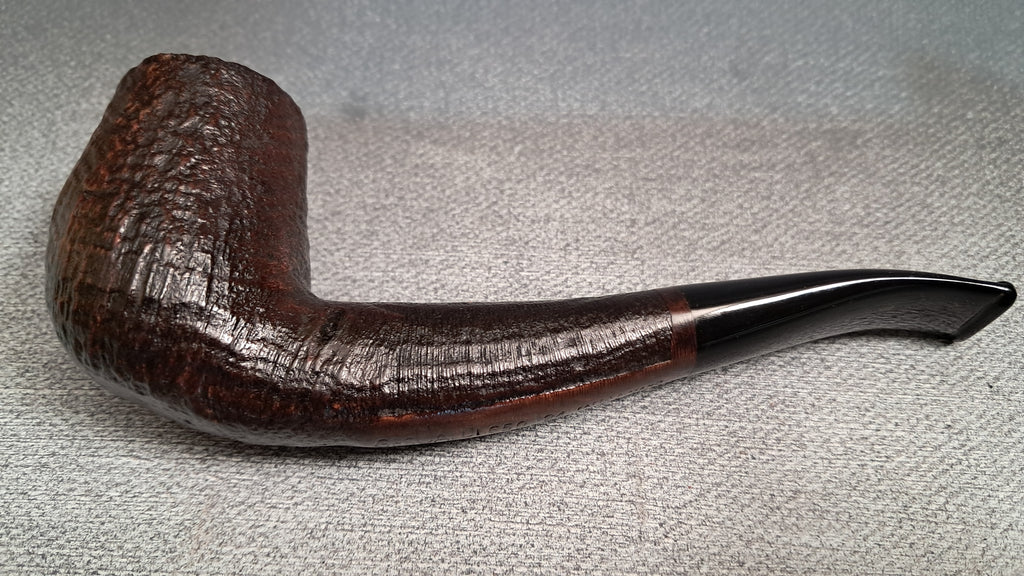 Semi-bent, sandblasted hand-made pipe