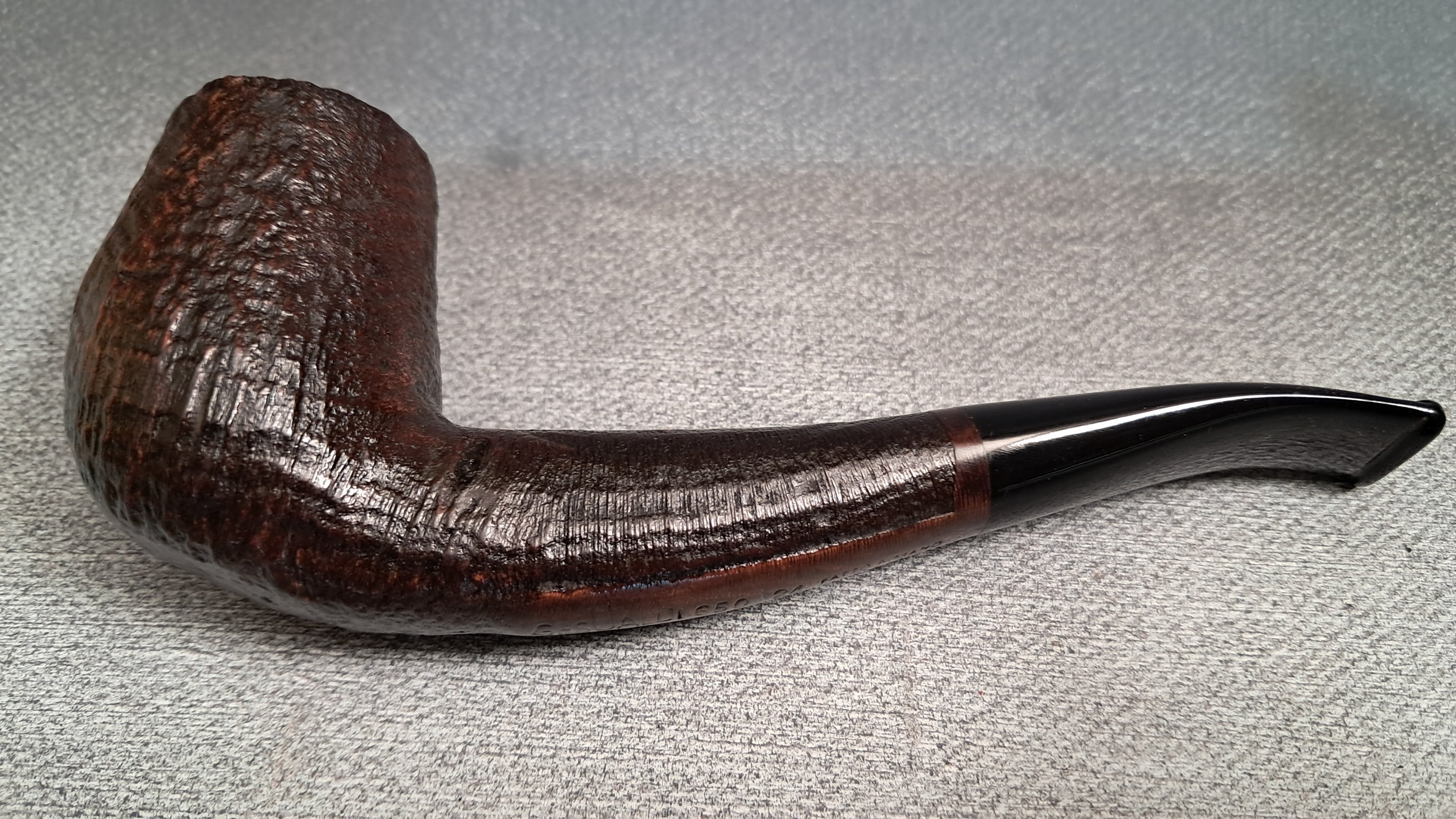 Semi-bent, sandblasted hand-made pipe