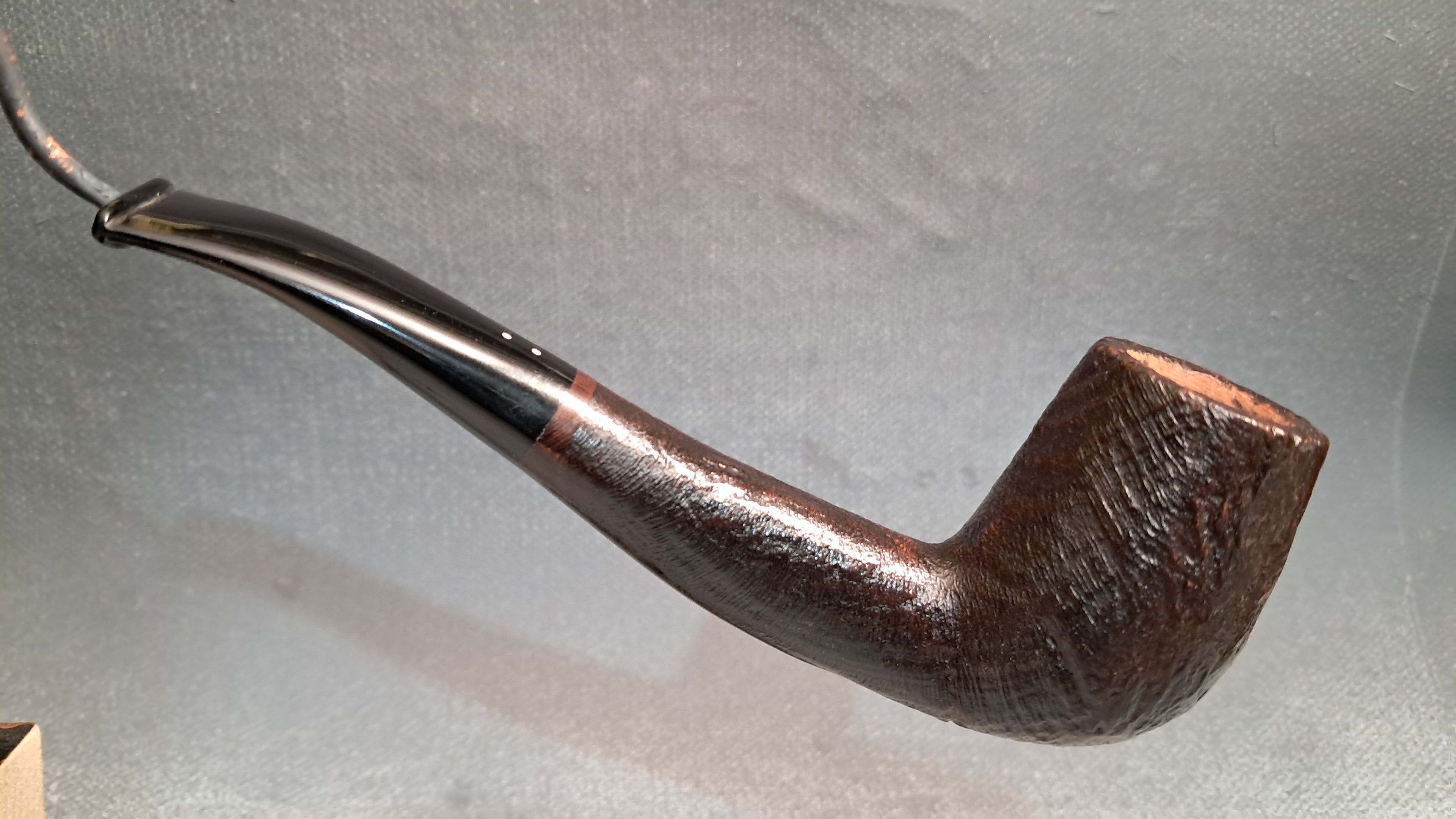 Semi-bent, sandblasted hand-made pipe