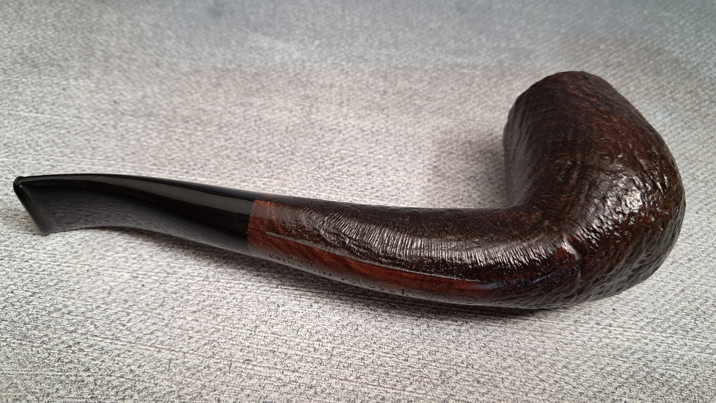 Semi-bent, sandblasted hand-made pipe