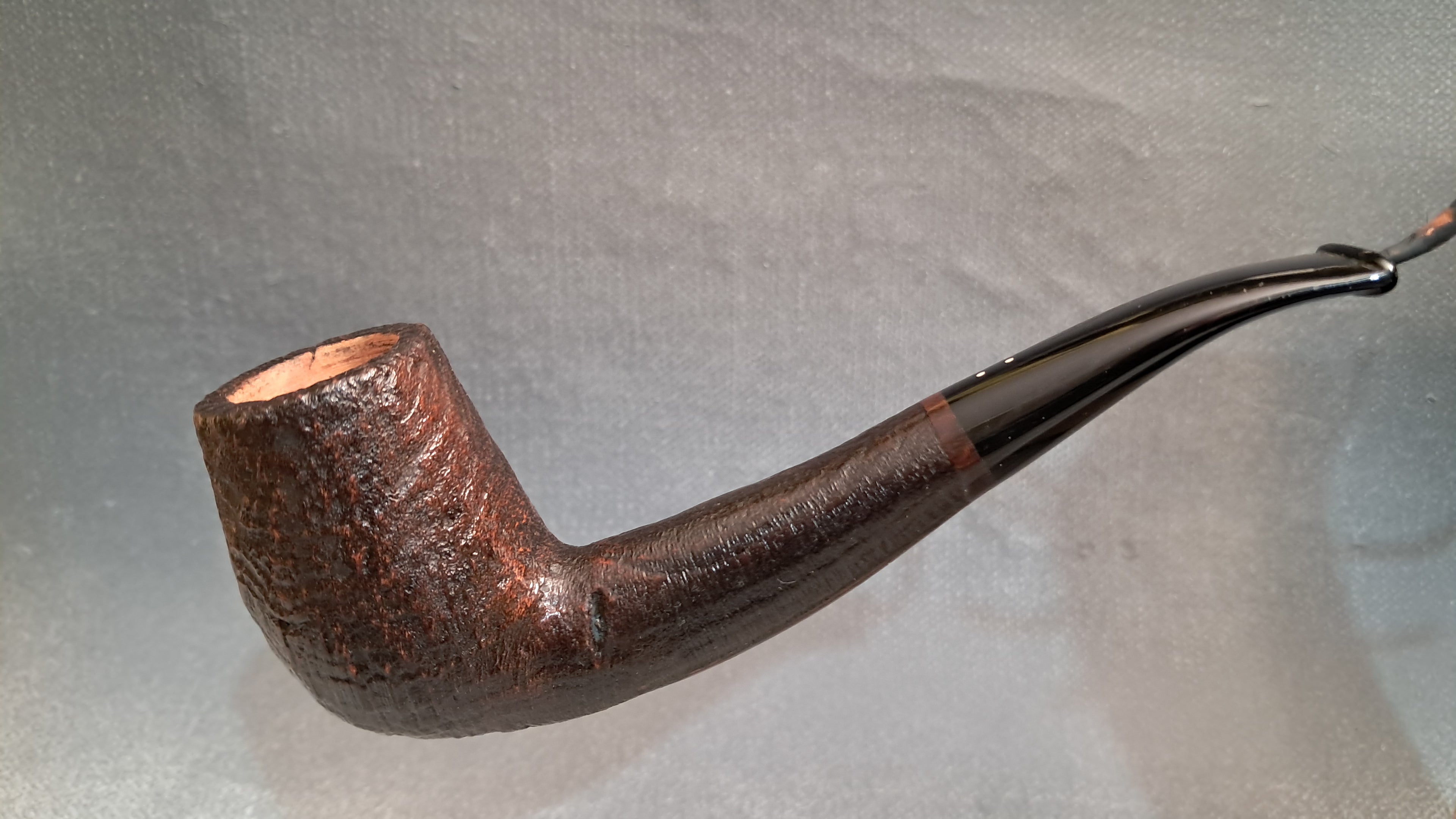 Semi-bent, sandblasted hand-made pipe